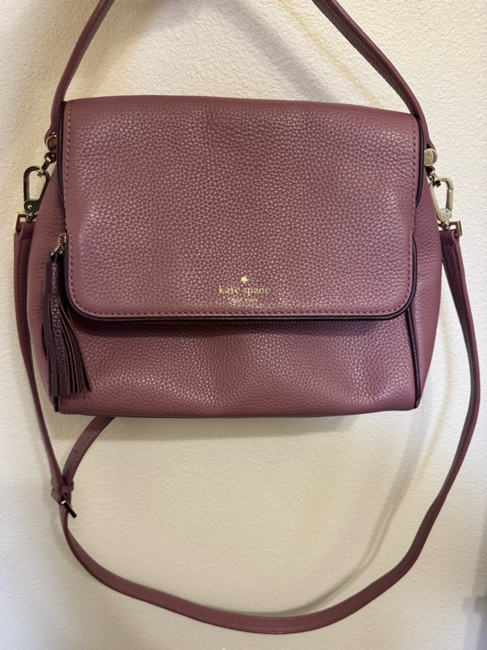 kate spade dusty mauve pebbled leather crossbody with tassel